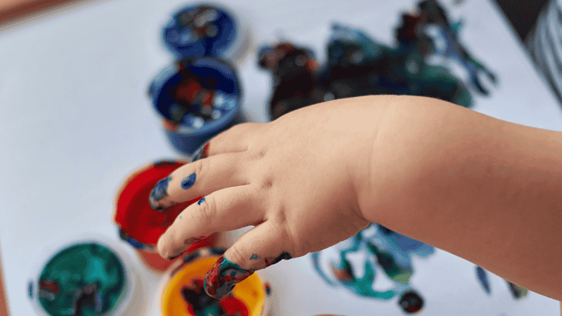 A vibrant illustration from a children's book showing different colors representing emotions like calm, anger, and sadness, helping 3-year-olds build emotional vocabulary.
